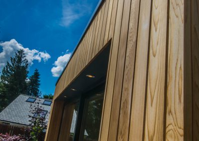 Cedar cladding detail on garden room in The Lake District