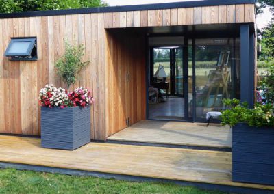 Garden living annexe with cedar cladding and deck