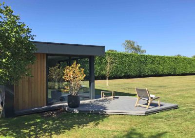 large garden with garden room