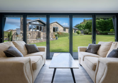 multipurpose garden room interior with sofas